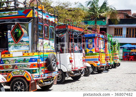 Motor-tricycles decorated as traditional Colombian 36807482