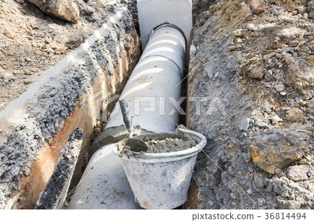 worker install concrete manholes construction; 36814494