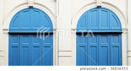White wall and blue doors White wall and blue doors 36816353
