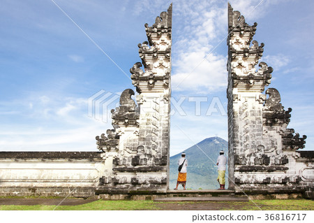 Indonesia - Bali - tourist standing betwen 36816717