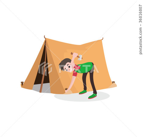 Young smiling teenager boy setting up tourist tent Young smiling teenager boy setting up tourist tent 36816807