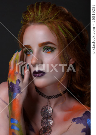 Portrait of a beautiful woman with a creative style Portrait of a beautiful woman with a creative style 36819285