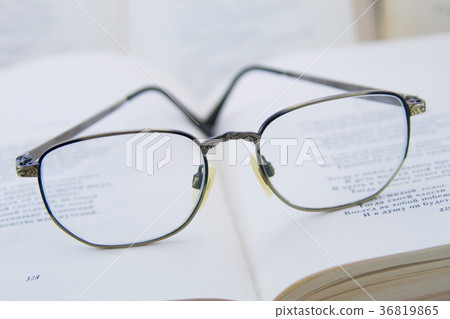 Glasses on the book Glasses on the book 36819865