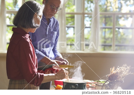 Senior couple cooking Senior couple cooking 36820518