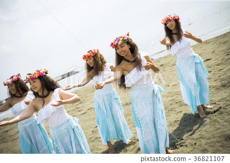 Hula dancer dancing on the beach 36821107
