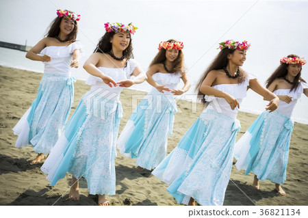 Hula dancer dancing on the beach 36821134
