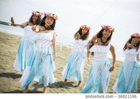 Hula dancer dancing on the beach 36821196