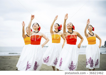 Hula dancer dancing on the beach 36821462