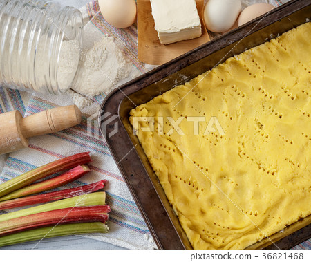 Raw dough for rhubarb pie with ingredients 36821468