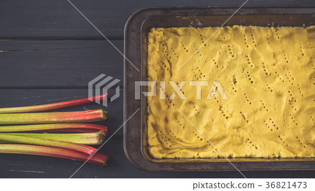 Raw dough for pie in baking pan Raw dough for pie in baking pan 36821473