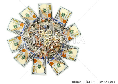 Gold jewelry and dollars isolated on white  36824364