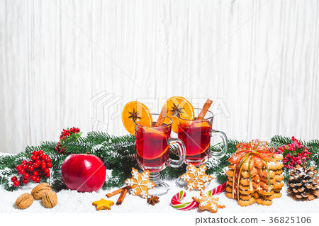 Christmas glass of red mulled wine on table Christmas glass of red mulled wine on table 36825106