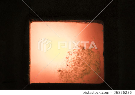 Molten metal in sand mold after pouring; 36826286