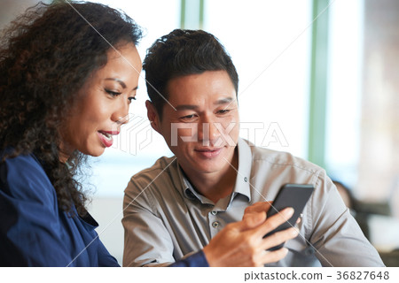 Reading news in smartphone Reading news in smartphone 36827648