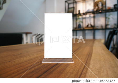 Mock up Menu frame standing on wood table Mock up Menu frame standing on wood table 36828327