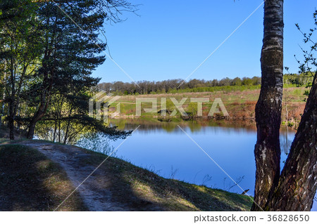 The blue water of the river and the blue sky The blue water of the river and the blue sky 36828650