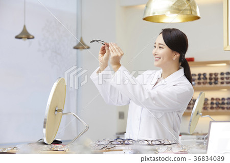 Female, optician, optician Female, optician, optician 36834089