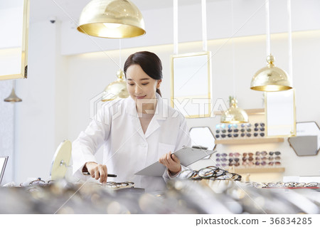 Female, optician, optician 36834285