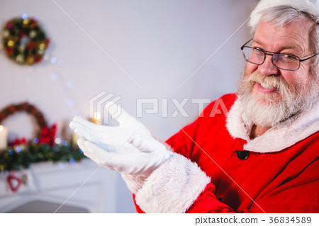 Santa standing with his hands cupped Santa standing with his hands cupped 36834589