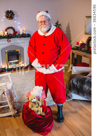 Santa claus standing with his hands on waist Santa claus standing with his hands on waist 36834590