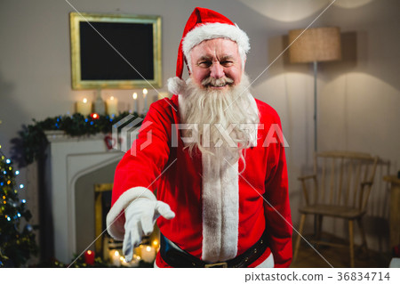 Portrait of smiling Santa Claus gesturing 36834714