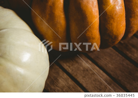 Close up of pumpkins on wooden table 36835445