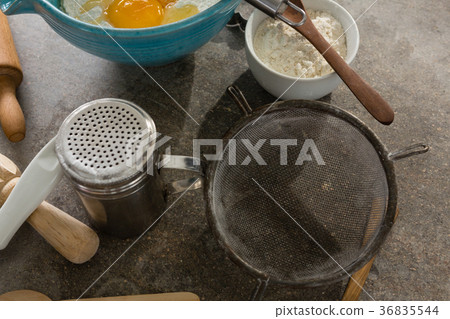 Gingerbread cookies ingredients with various utensils on table Gingerbread cookies ingredients with various utensils on table 36835544