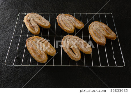 Fresh baked cookies on baking tray 36835685