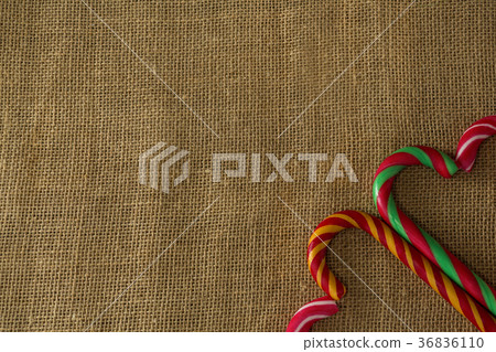 Heart shaped candy cane on on fabric Heart shaped candy cane on on fabric 36836110