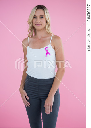 Portrait of happy young woman with Breast Cancer Awareness ribbon Portrait of happy young woman with Breast Cancer Awareness ribbon 36836367