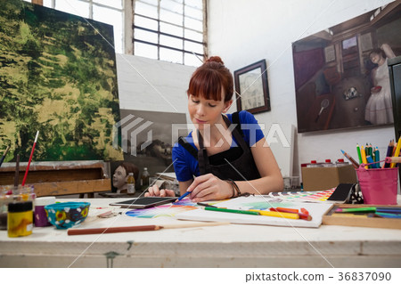 Beautiful woman matching color with color swatch 36837090