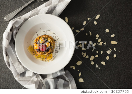 Plate of breakfast cereals with fruits Plate of breakfast cereals with fruits 36837765