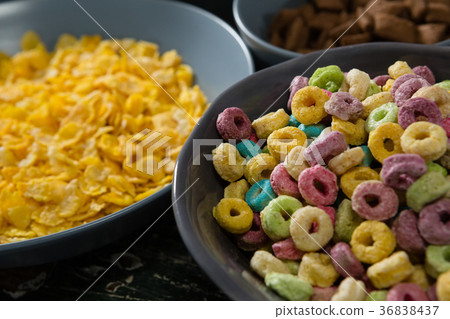 Bowl of froot loops and cornflakes  36838437