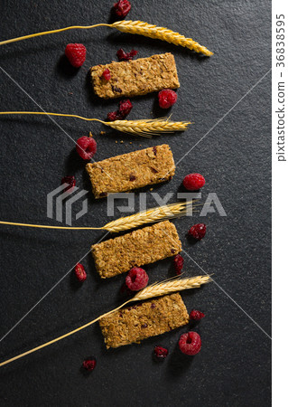 Granola bar with fruits on concrete background 36838595