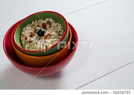 Muesli with blueberry in bowl Muesli with blueberry in bowl 36838791