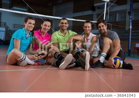 Portrait of happy volleyball players relaxing Portrait of happy volleyball players relaxing 36841043