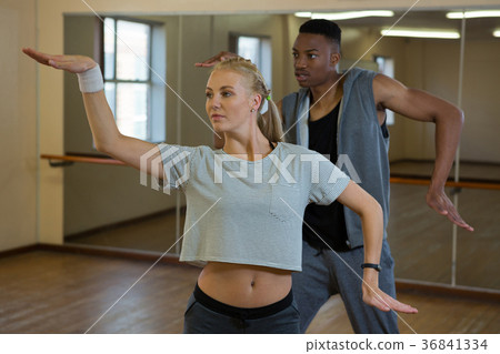 Female dancer with friend rehearsing 36841334