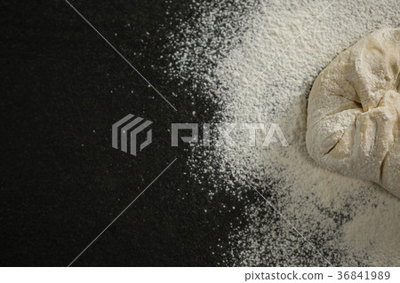 Cropped image of flour on dough 36841989
