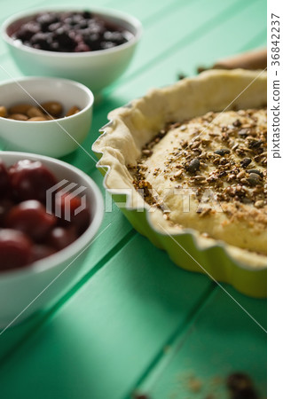 Close up of tart with olives and alomds Close up of tart with olives and alomds 36842237