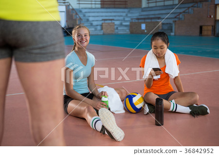 Smiling female players having a break Smiling female players having a break 36842952