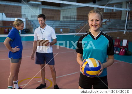 Portrait of volleyball player holding ball Portrait of volleyball player holding ball 36843038