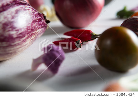 Close-up of red chili peppers with olive Close-up of red chili peppers with olive 36843424