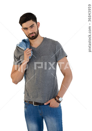 Handsome man posing against white background 36843959