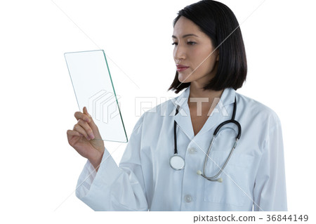 Female doctor holding a glass digital tablet 36844149