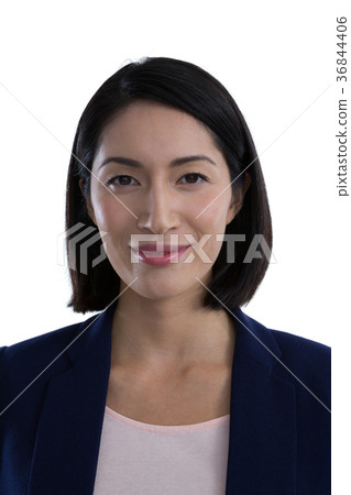 Confident businesswoman against white background 36844406