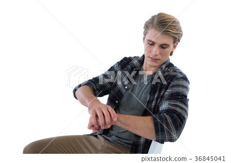 Businessman looking at imaginary wristwatch Businessman looking at imaginary wristwatch 36845041