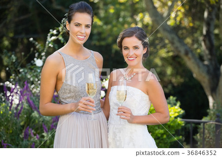 Portrait of bride and bridesmaid in wedding ceremony 36846352