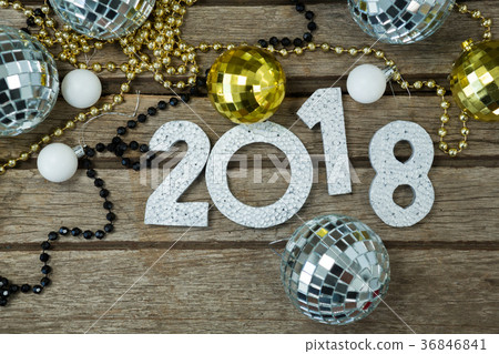 New year number 2018 surrounded by colorful shiny babules New year number 2018 surrounded by colorful shiny babules 36846841