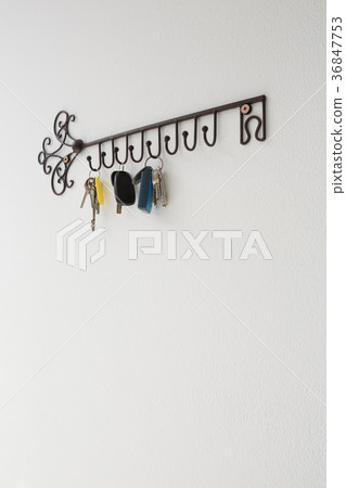 Various keys hanging on hook 36847753