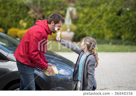 Teenage girl and father having fun 36848356